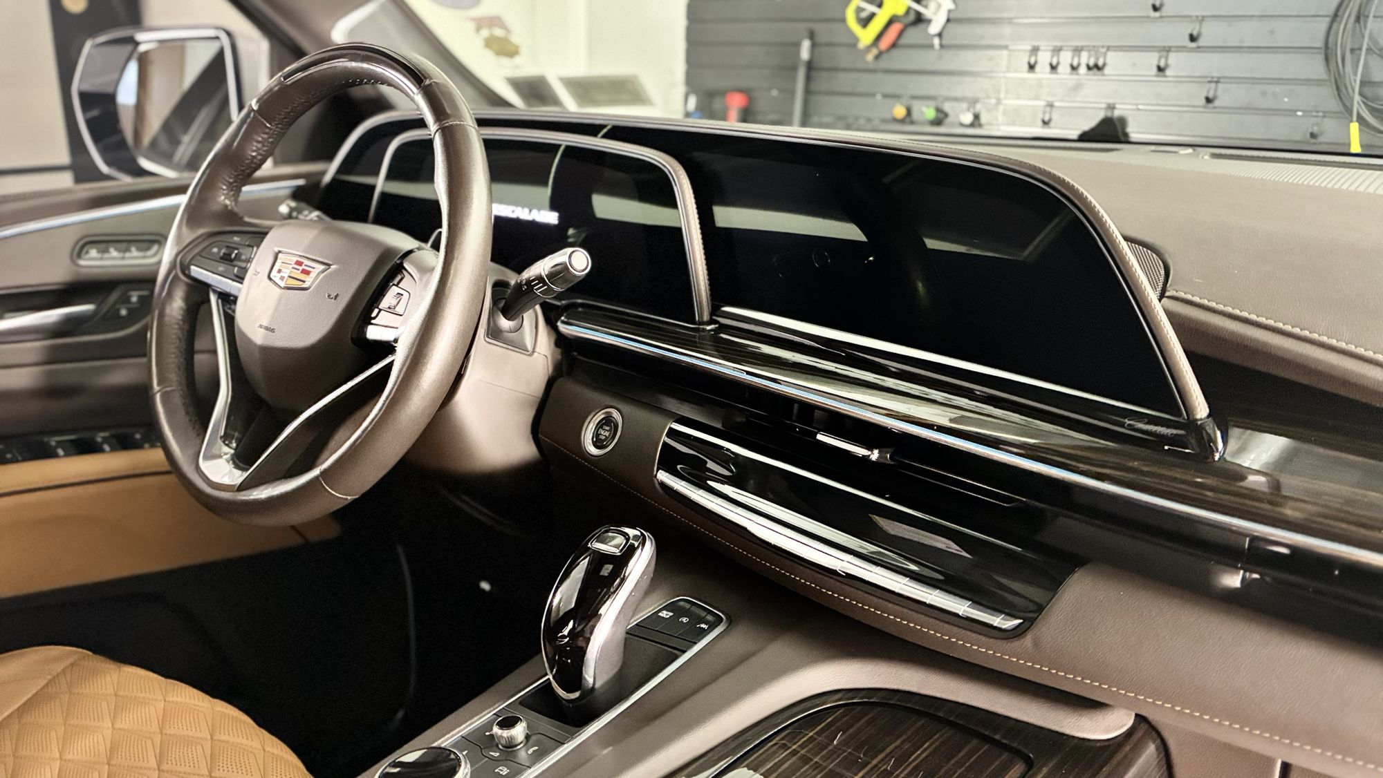 Cadillac Escalade interior with a spotless dash, glossy trim and clean leather after a detail